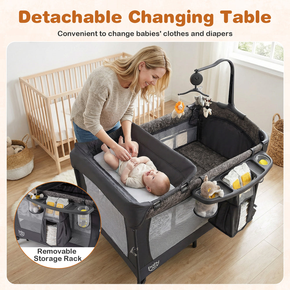 Detachable changing table on the 5-in-1 bedside bassinet, featuring storage pockets for convenient diaper changes.