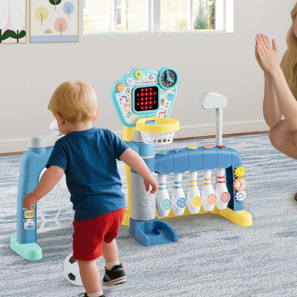 Toddler playing with a 5 in 1 sports toy featuring an adjustable basketball hoop, soccer goal, and interactive sounds.