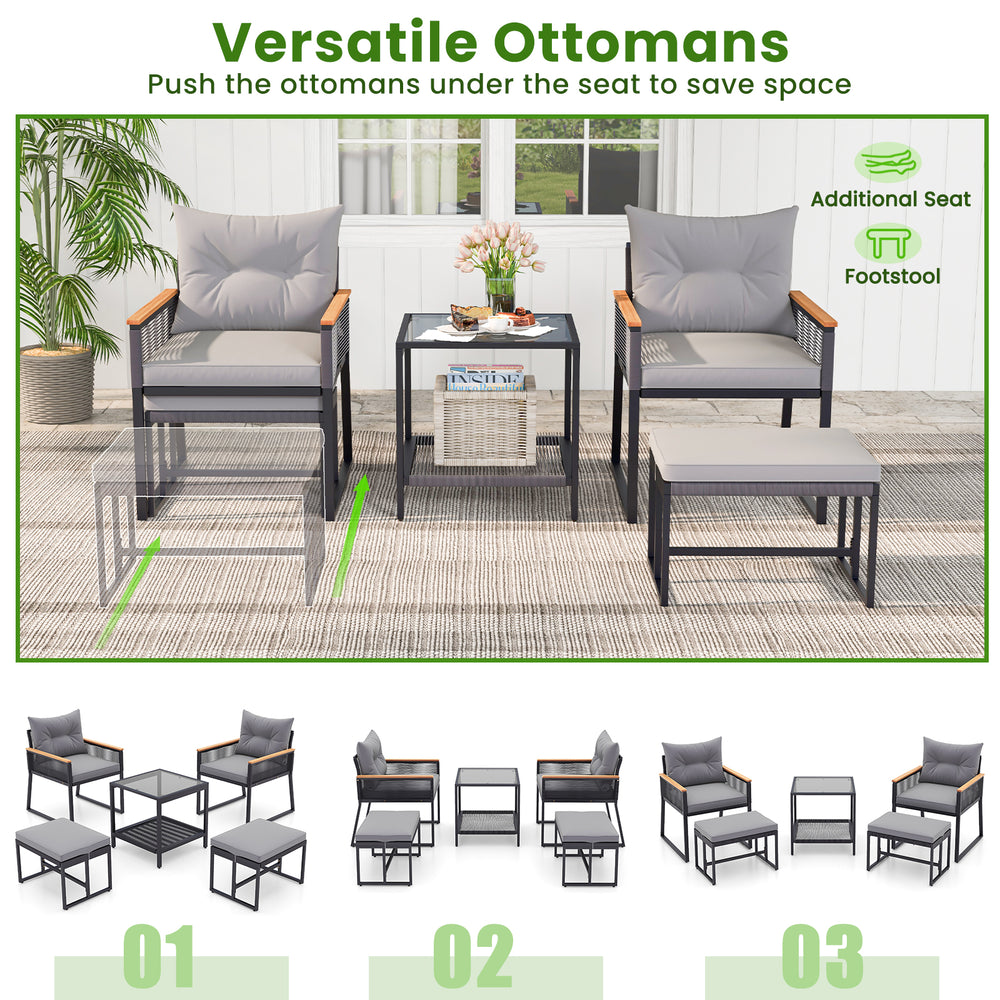 Two comfortable gray ottomans with a 2-layer side table in a 5-piece outdoor rattan conversation set for backyard.
