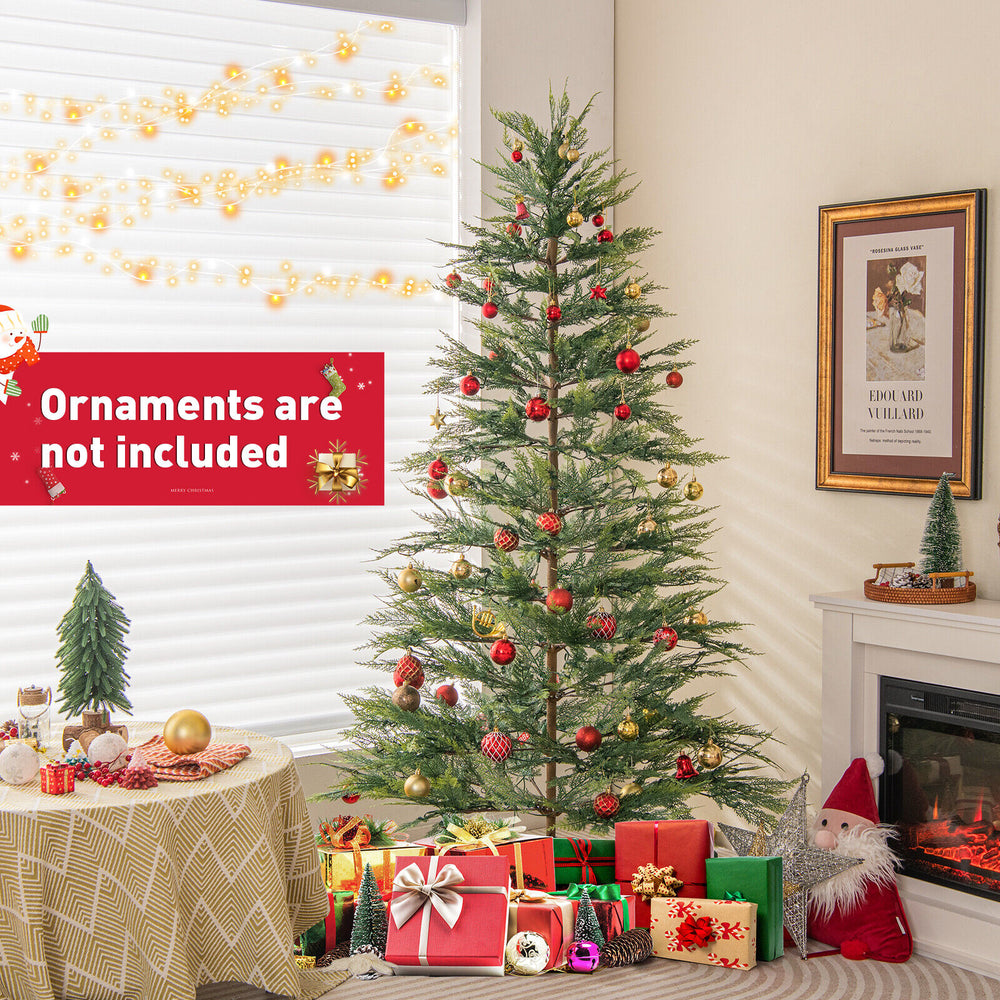 6.5 ft pre-lit artificial cypress Christmas tree with warm white lights, featuring realistic foliage and a hinged.