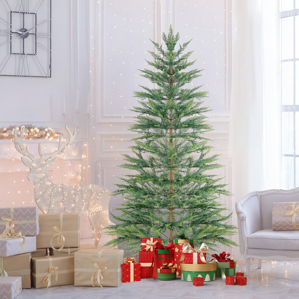 6.5 ft pre-lit artificial cypress Christmas tree with warm white lights and realistic branches, perfect for festive.