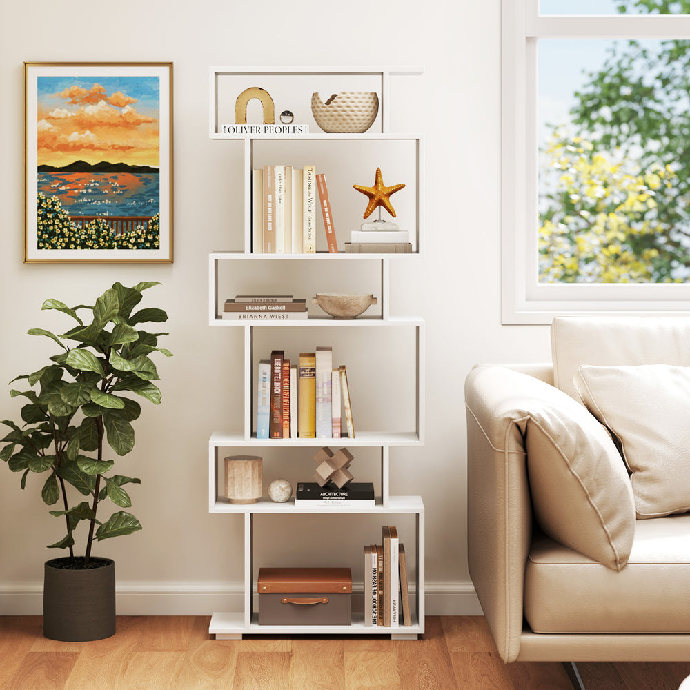 6-tier geometric bookshelf in white with books and decor, featuring anti-tipping kits for home office safety.
