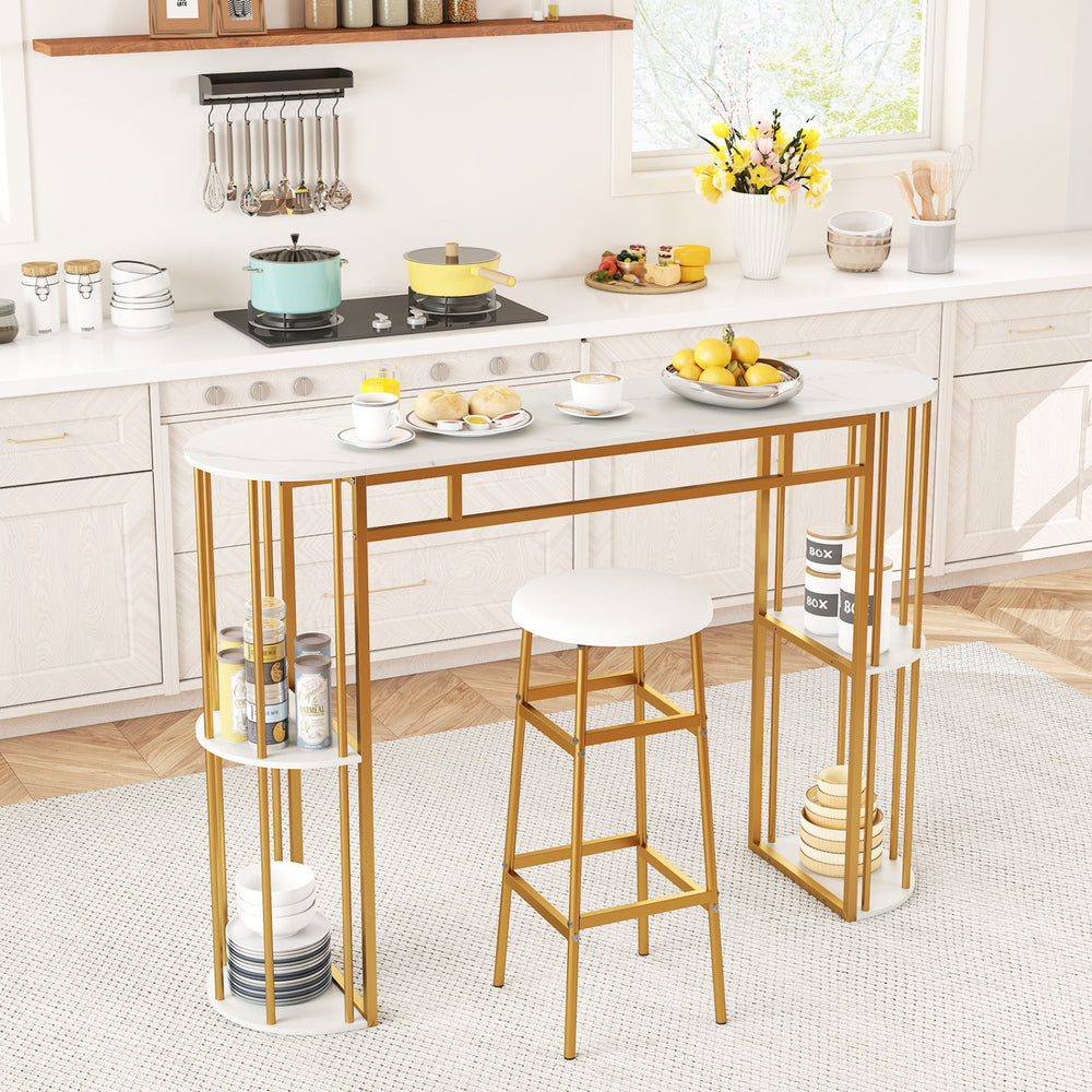 Narrow 60-inch bar table with faux marble top and gold metal frame, featuring storage shelves for small kitchens.