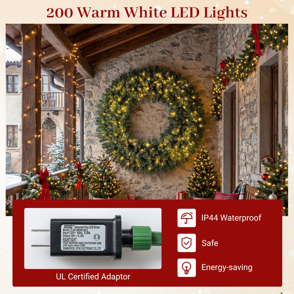 60-inch pre-lit artificial Christmas wreath with 200 warm white LED lights, showcasing frosted branch tips and pine.