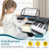 61-key electronic keyboard piano set with stand, bench, and headphones, featuring 3 teaching modes for beginners.