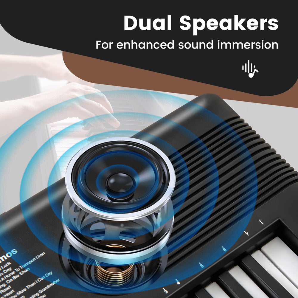 Close-up of dual speakers on a 61 key electric portable digital keyboard piano for enhanced sound immersion.