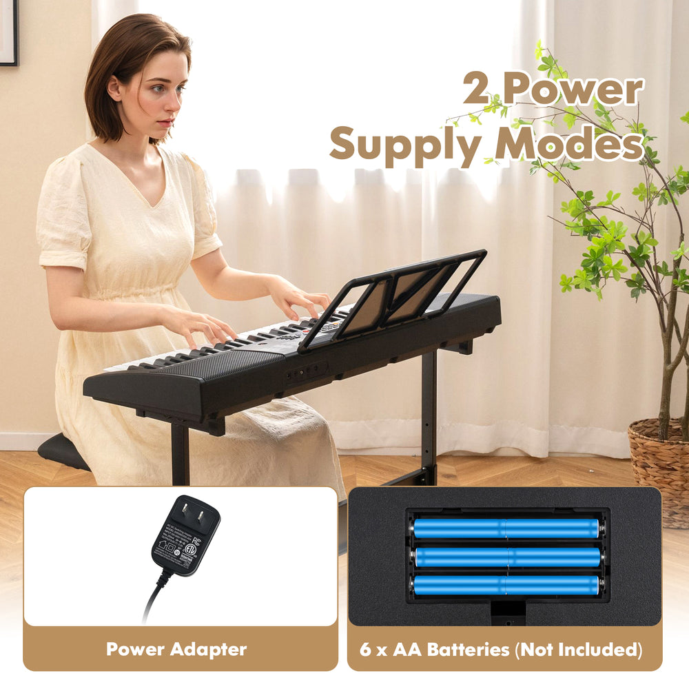 61-key portable electronic keyboard piano with stand and stool, featuring dual power supply modes for versatile use.