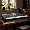 61-key electric keyboard with adjustable stand and stool, featuring light-up keys and dual keyboard function for.