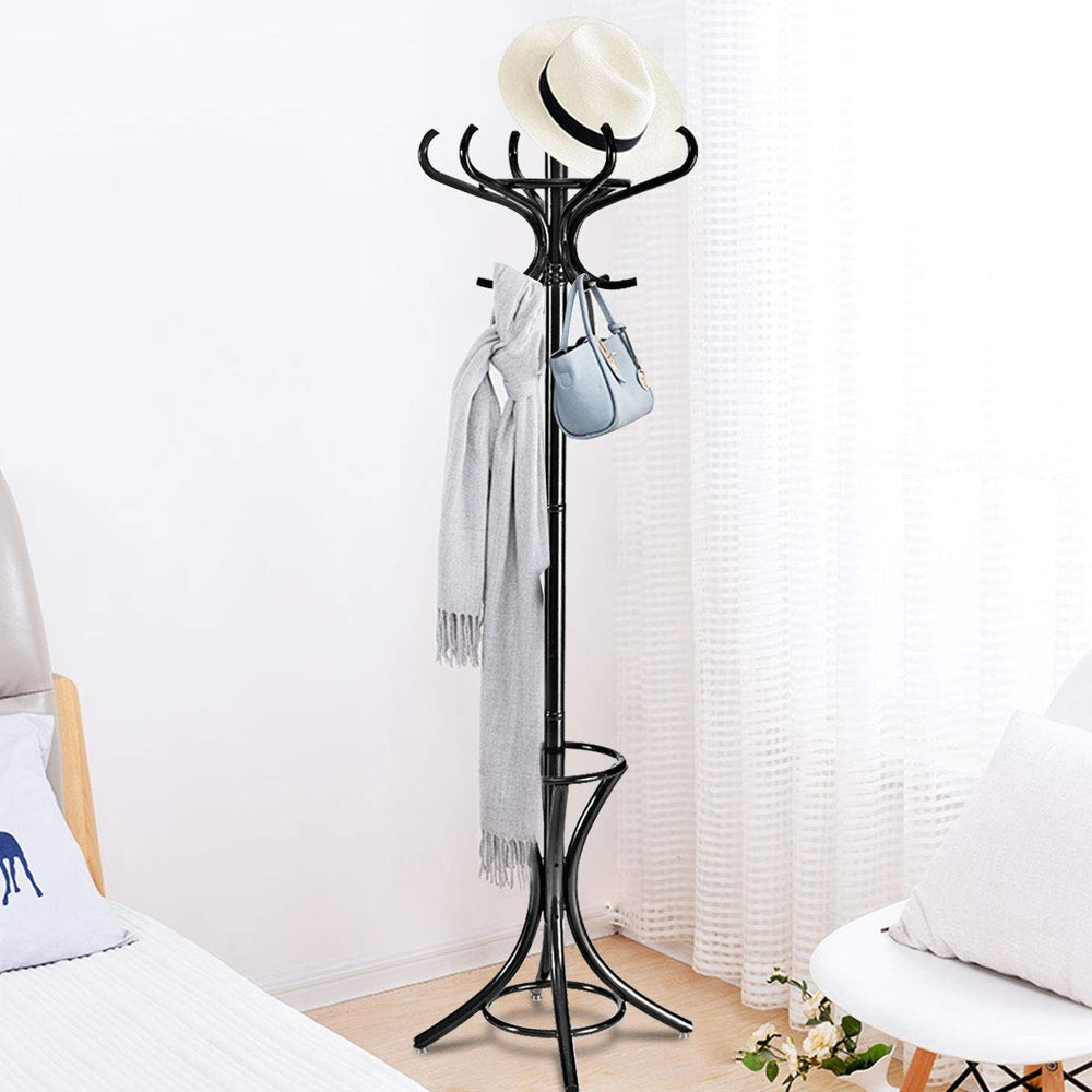 Wood standing coat rack in black with curved hooks and umbrella stand, perfect for stylish entryway organization.