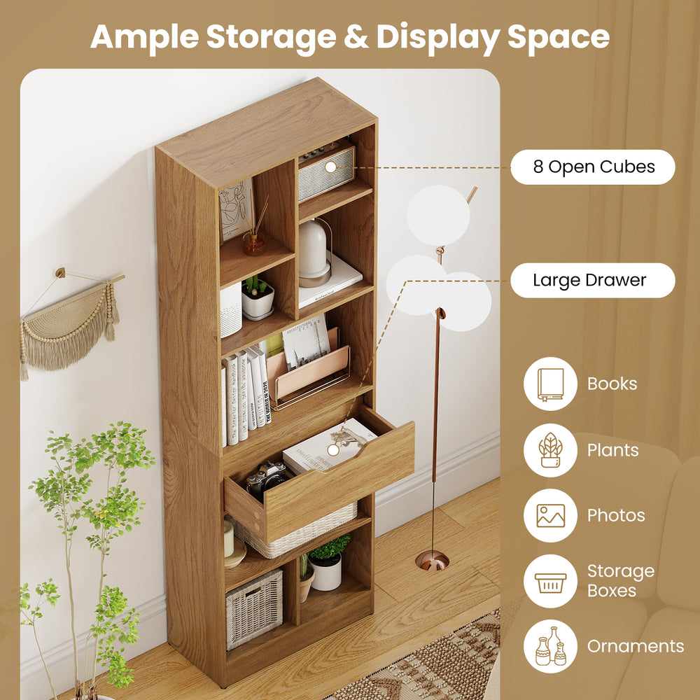 Tall freestanding bookcase with 8 open cubes and large drawer, ideal for books and ornaments in a modern decor.
