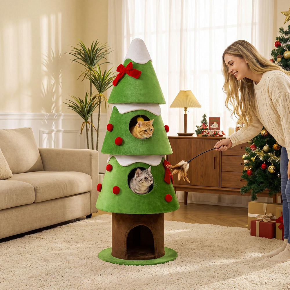Green 62-inch Christmas cat tree with three cozy condos and hanging balls, shown with cats in a festive living room.