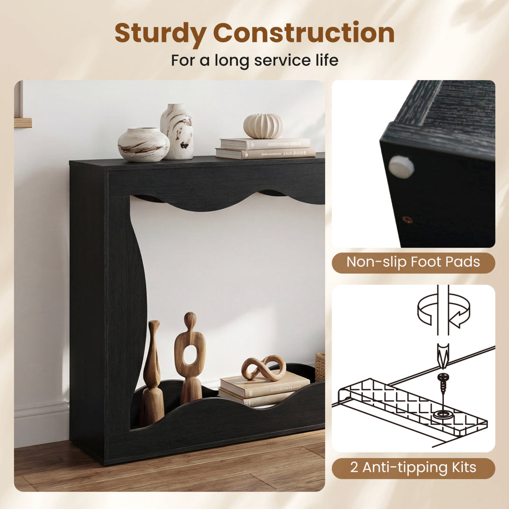 Black 63-inch console table with wavy edge, featuring 2-tier storage and non-slip foot pads for entryway or hallway use.