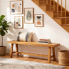 Solid wood bench in a living room setting, featuring teak wood, natural grain, and seating for up to 3 people.