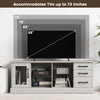 Media console table in gray accommodating TVs up to 73 inches, featuring 3 drawers and 2 removable glass shelves.