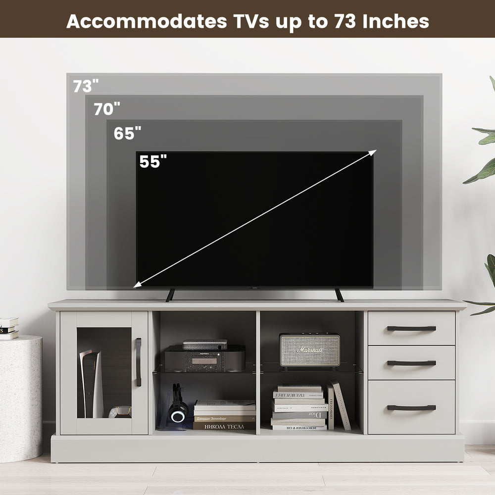 Media console table in gray accommodating TVs up to 73 inches, featuring 3 drawers and 2 removable glass shelves.