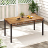 63" outdoor dining table featuring a durable acacia wood slatted top and unique PE rattan legs, ideal for yard or.