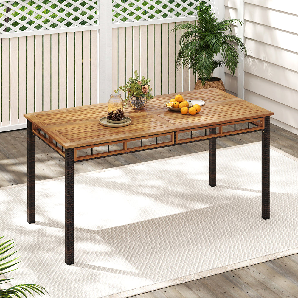 63" outdoor dining table featuring a durable acacia wood slatted top and unique PE rattan legs, ideal for yard or.