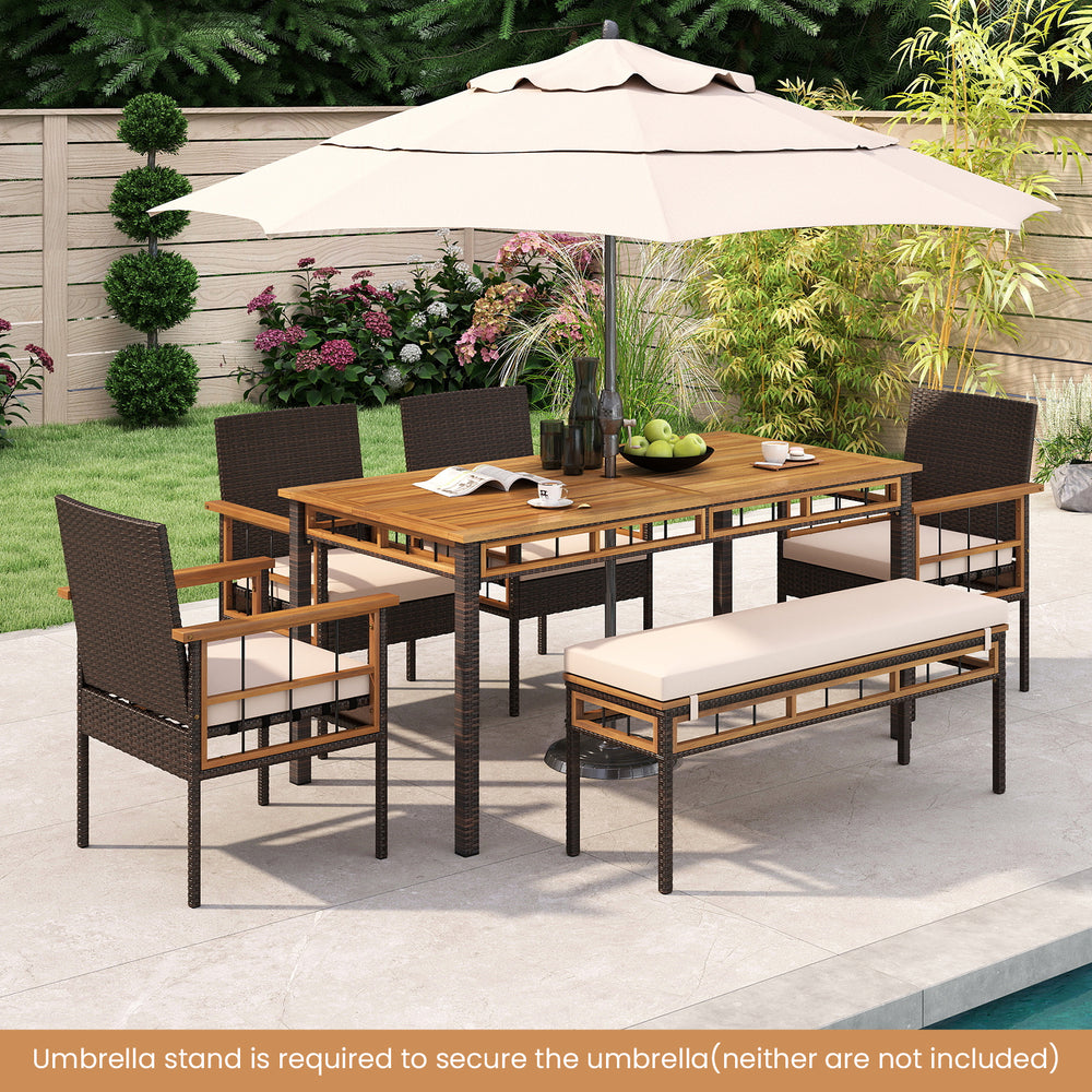 Outdoor dining table with acacia wood slatted top, PE rattan legs, seating for 6, perfect for yard or poolside use.