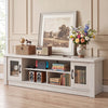 Spacious 63” wooden farmhouse TV stand in white with fluted doors and open compartments for stylish media storage.