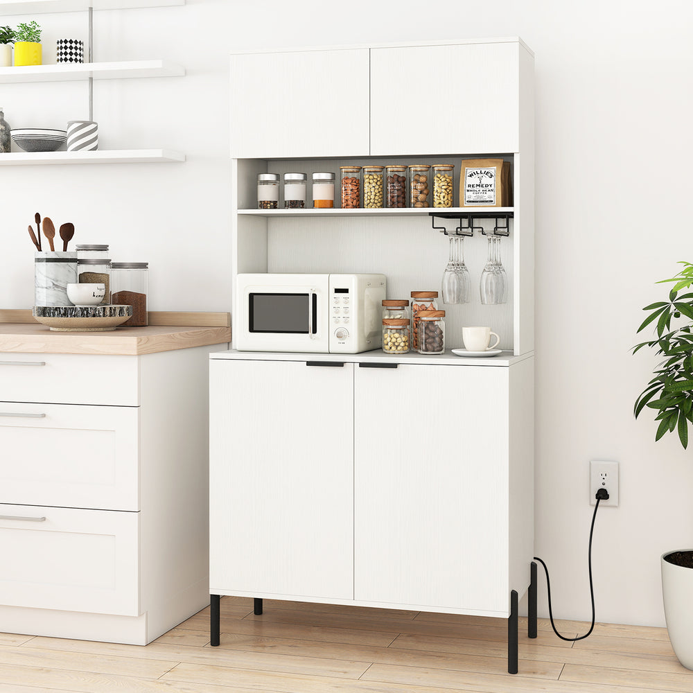Tall white kitchen pantry cabinet with charging station, wine glass rack, and ample storage for utensils and decor.