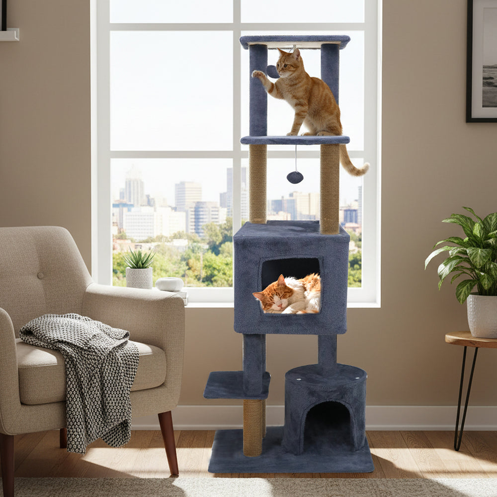 Tall dark grey cat tree featuring two condos, climbing platforms, and jute scratching posts for indoor adult cats.