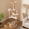 Cat tree with beige soft hammock, multiple platforms, and sisal scratching posts for indoor cats to play and relax.