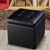 Black foldable cube ottoman pouffe with cushioned top for storage, ideal for organizing toys and accessories.