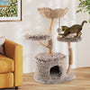 Wood cat tree with plush fabric, natural pear wood, and sisal scratching posts, perfect for lounging and play.