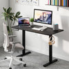 Ergonomic electric standing desk in black, 48" x 24", with adjustable height and 3 memory settings for home office use.