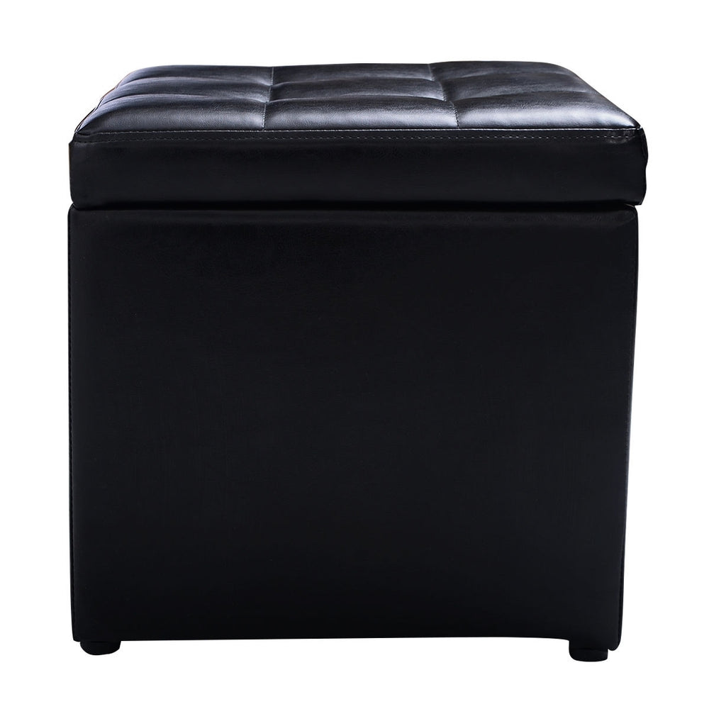 Black foldable cube ottoman pouffe with cushioned top, perfect for storage of toys and accessories.