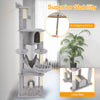 Multi-level 69-inch cat tree with top perch, cozy condo, and large base for stability, wrapped in soft plush fabric.