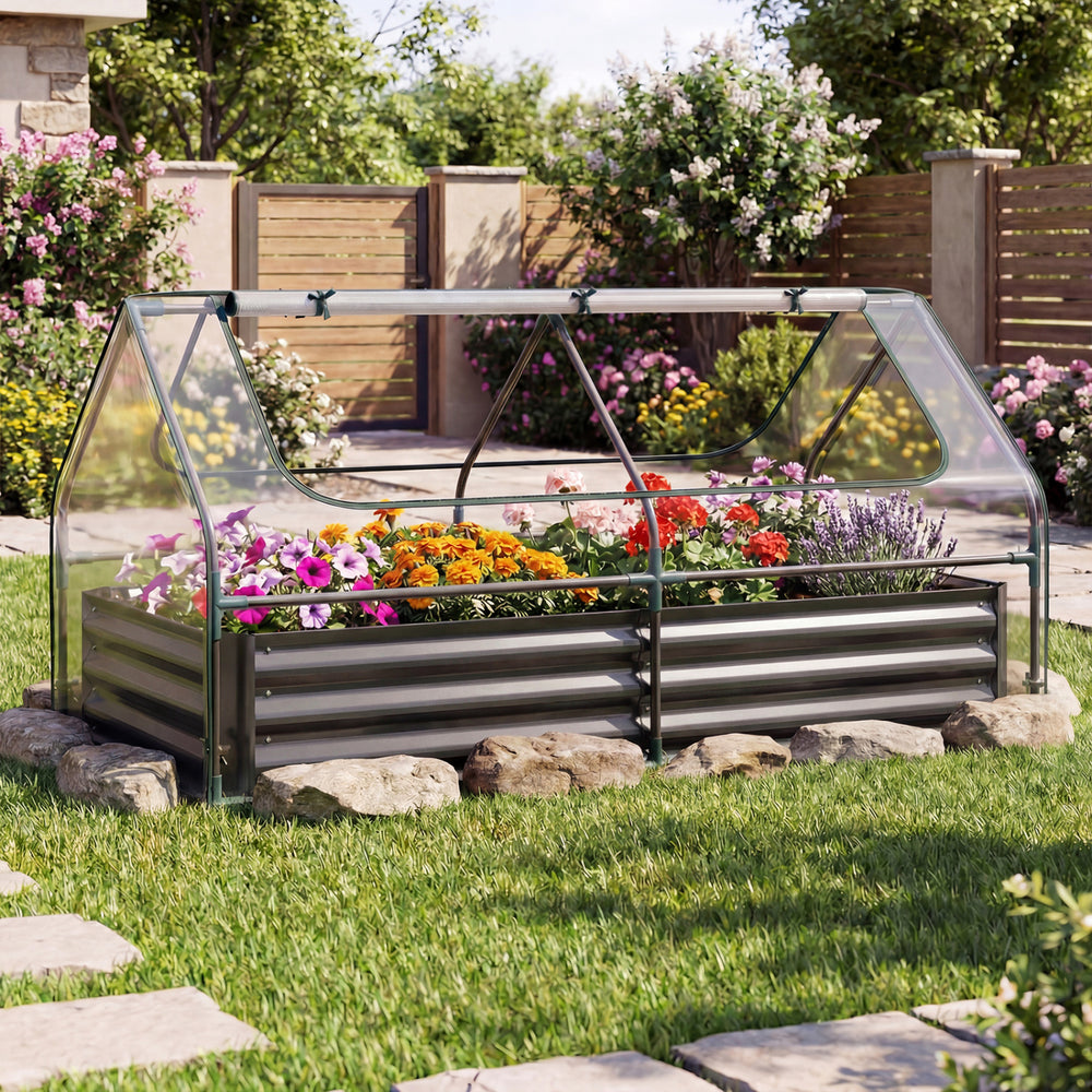 Galvanized raised garden bed with a black PVC cover, featuring roll-up windows and vibrant flowers for outdoor.