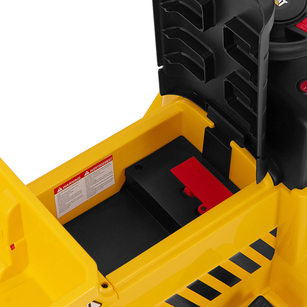 Close-up of the battery compartment in the 6V Electric Caterpillar Construction Vehicle, featuring a hidden charging.