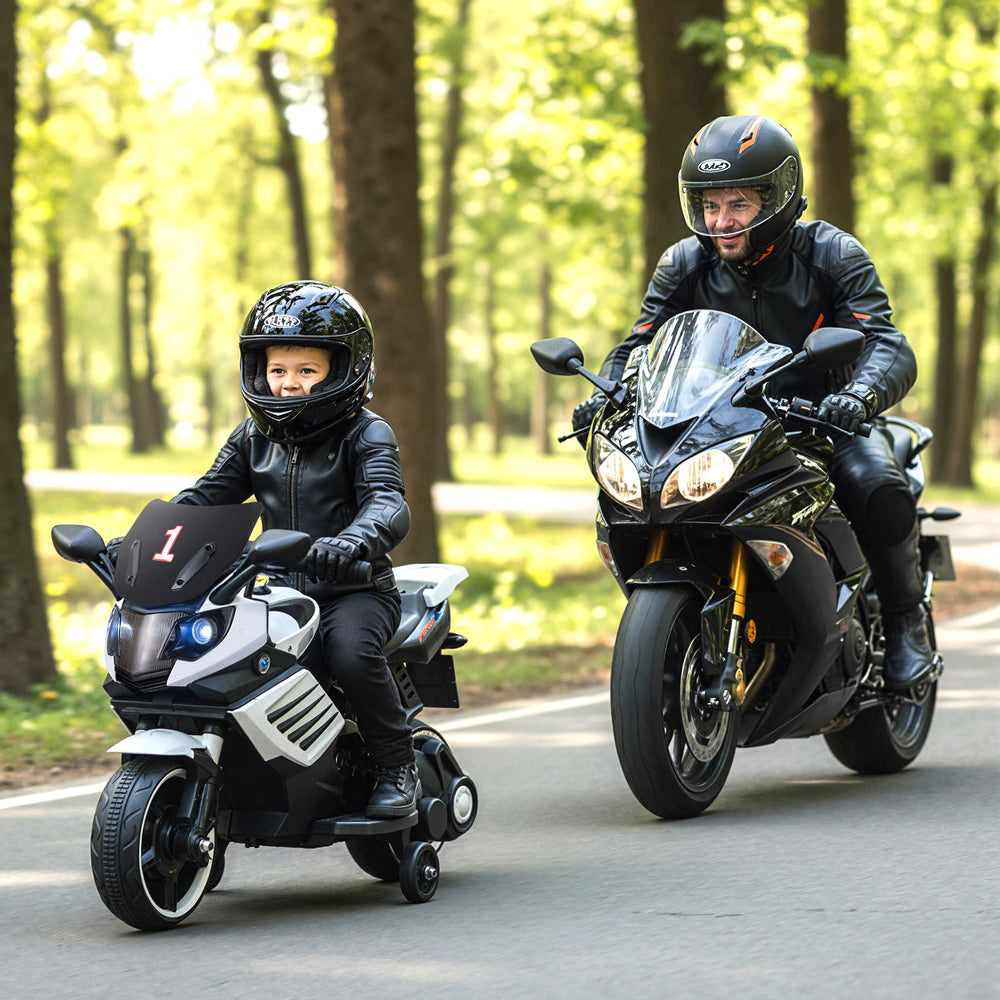 Kids motorcycle in white with headlights, music, and detachable training wheels, perfect for outdoor fun and stable.