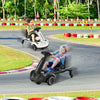 Kids riding on 6V drift cars with 360° spin capability, adjustable heights, and durable wheels for outdoor fun.