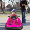 Pink 6V kids ride-on go-kart with remote control, safety belt, and spacious seat for outdoor fun and safety.