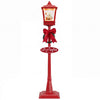 Red 6.1 ft musical Christmas streetlight with LED lights, featuring a Santa scene, snowflakes, and festive decorations.