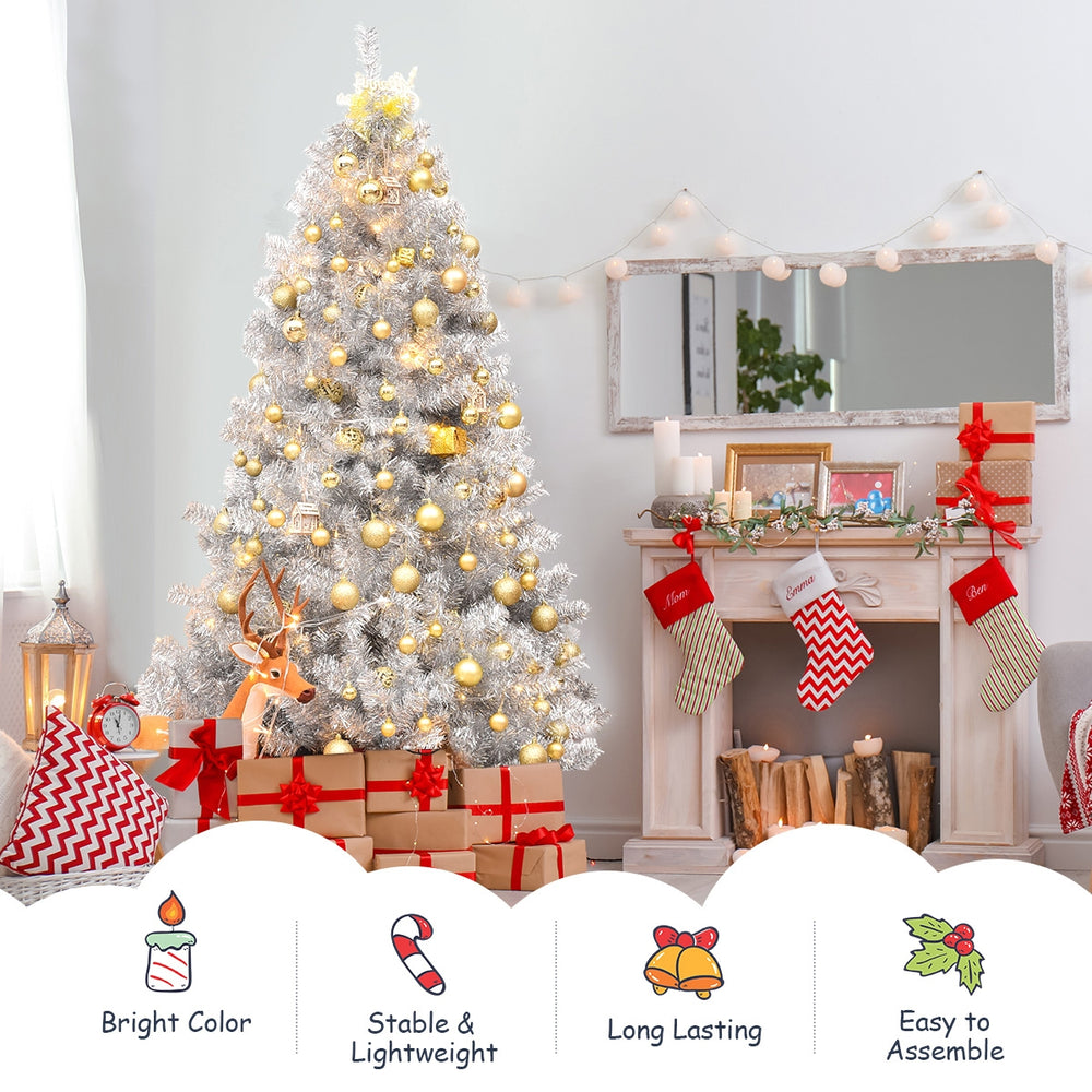 6 feet silver tinsel Christmas tree with 1036 branch tips, sturdy metal stand, perfect for festive indoor decoration.