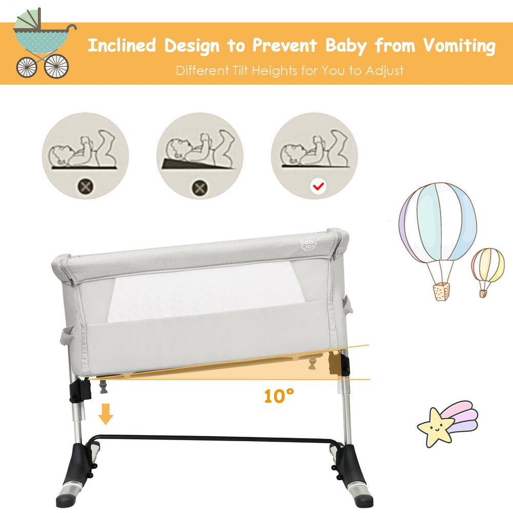 Travel portable baby bed side sleeper in beige with adjustable heights and tilt design for safe, comfortable sleep.