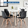 Modern black plastic side chair set of 4 with beech wood legs, perfect for dining or office use.