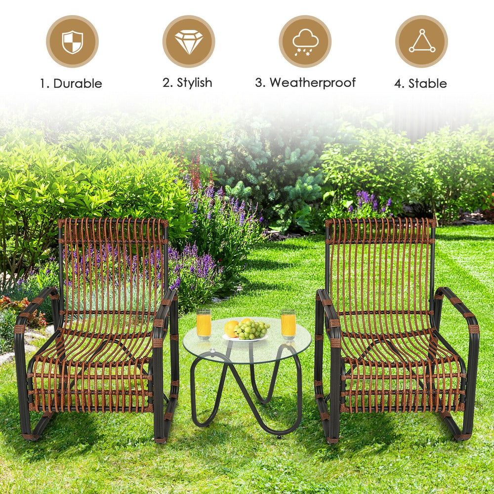 Two stylish single wicker chairs with a glass side table, perfect for outdoor patio relaxation.