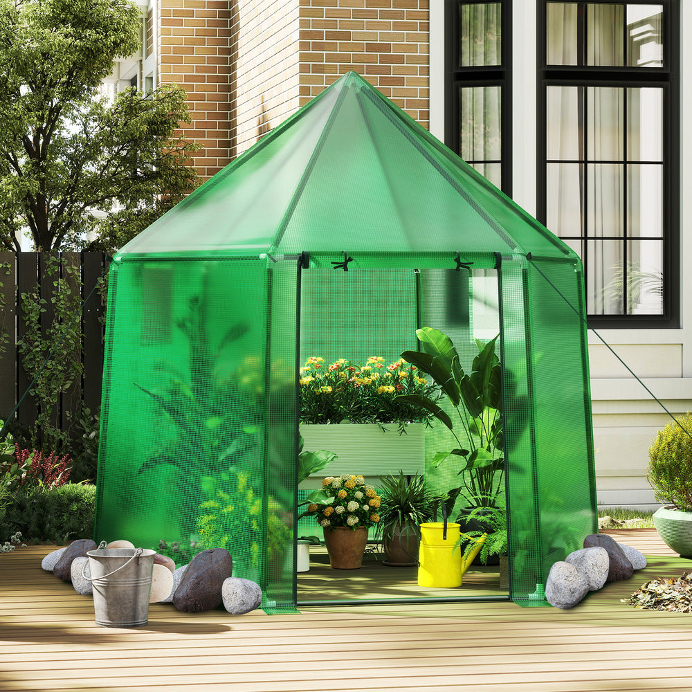 Mini walk-in greenhouse with PE cover, sturdy metal frame, and roll-up door for outdoor plant protection and.