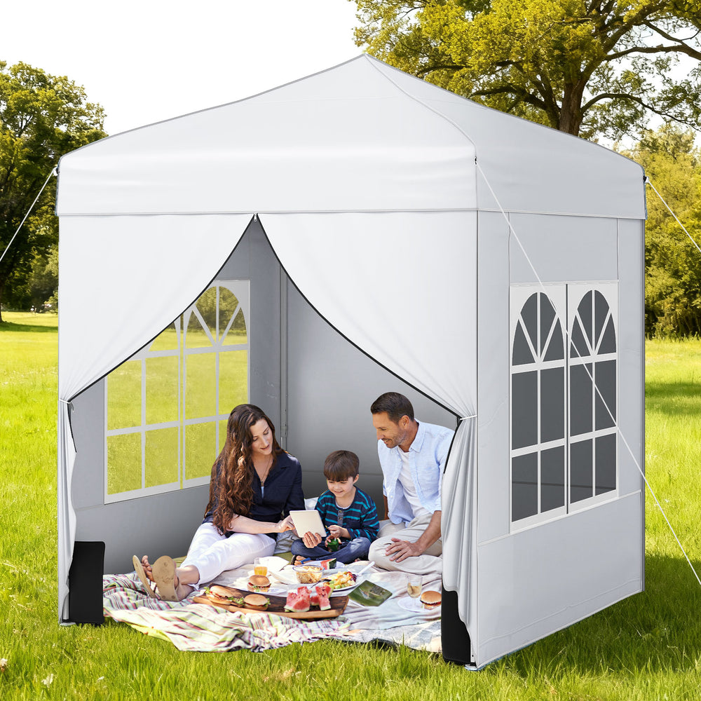 Pop up canopy tent with 4 sidewalls, ideal for picnics and outdoor events, featuring transparent windows for natural.