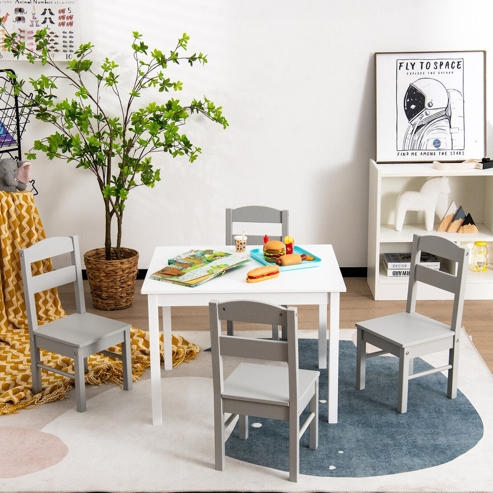 Kids 5-piece wooden table and chair set in white, perfect for playrooms, featuring rounded corners for safety.