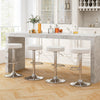 Set of 2 white PU leather swivel barstools with chrome footrest, perfect for bar or extra seating, shown at a kitchen.