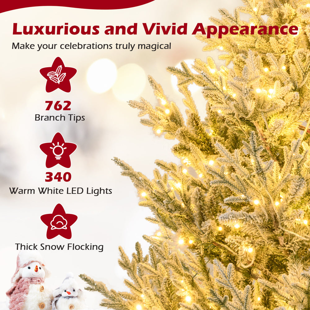 6-foot pre-lit artificial Christmas tree with 762 branch tips, thick snow flocking, and 340 warm white LED lights for.