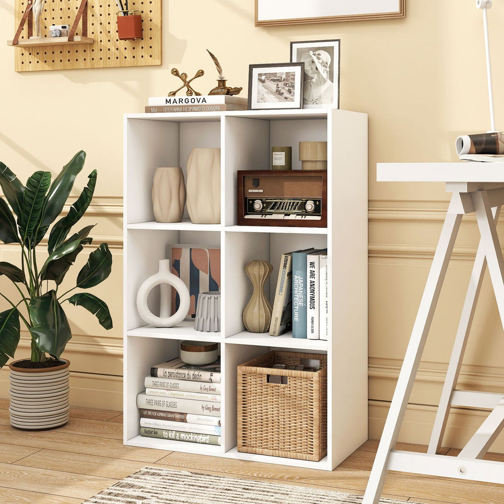 White 9-cube book shelf with a modern design, perfect for showcasing decor and organizing books in any living space.