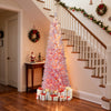 Snow-flocked 6 FT pink Christmas tree with warm white LED lights, perfect for holiday decoration in any home.
