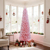 Pink 6 FT artificial Christmas tree with 460 branch tips in a cozy room, perfect for festive holiday decor.