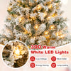 Close-up of the 6 ft artificial Xmas tree with 300 warm white LED lights, featuring white flocking for a wintry look.